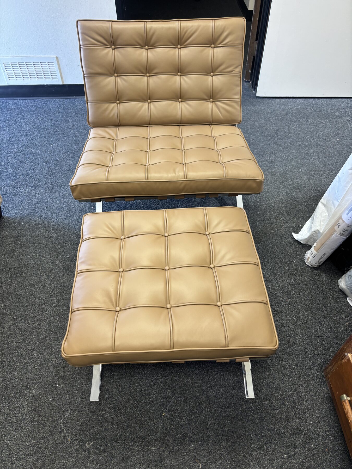 Restored original Knoll Barcelona chair and ottoman with newly paneled tan leather cushions